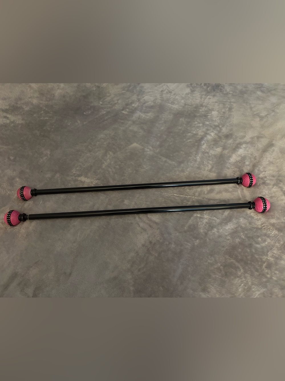 Pair of Black Metal Rods